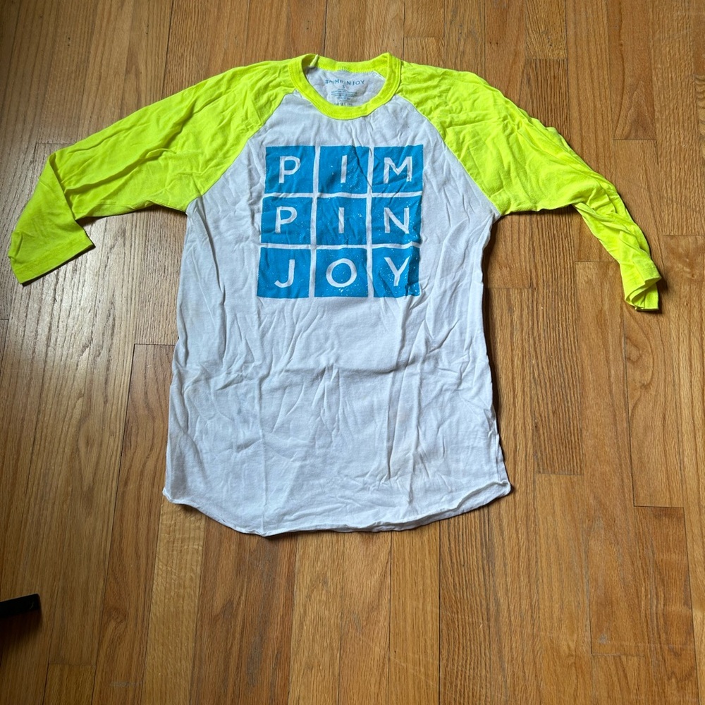 Pimpinjoy White and Neon Yellow Graphic Raglan Shirt from the Shop Forward